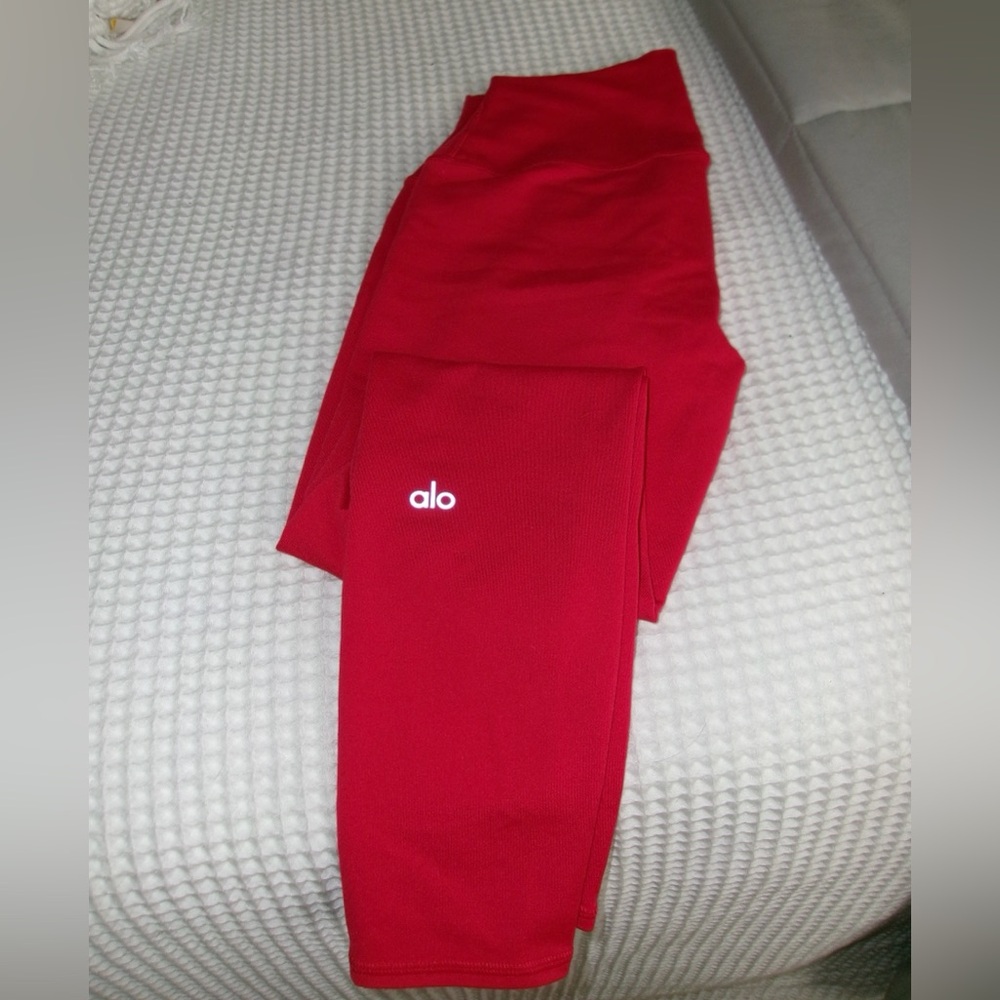 ALO Yoga High-Waist Airlift 7/8 Leggings in Classic Red.